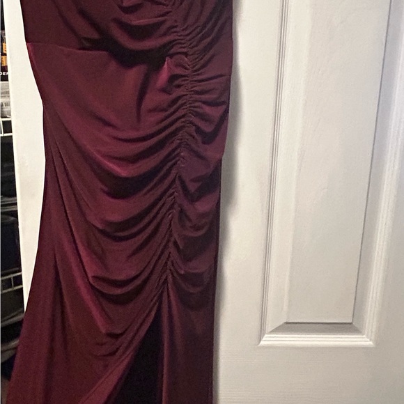 DB Studios bridesmaid dress. Form fitting with rouching on the side and a slit. - Picture 3 of 3